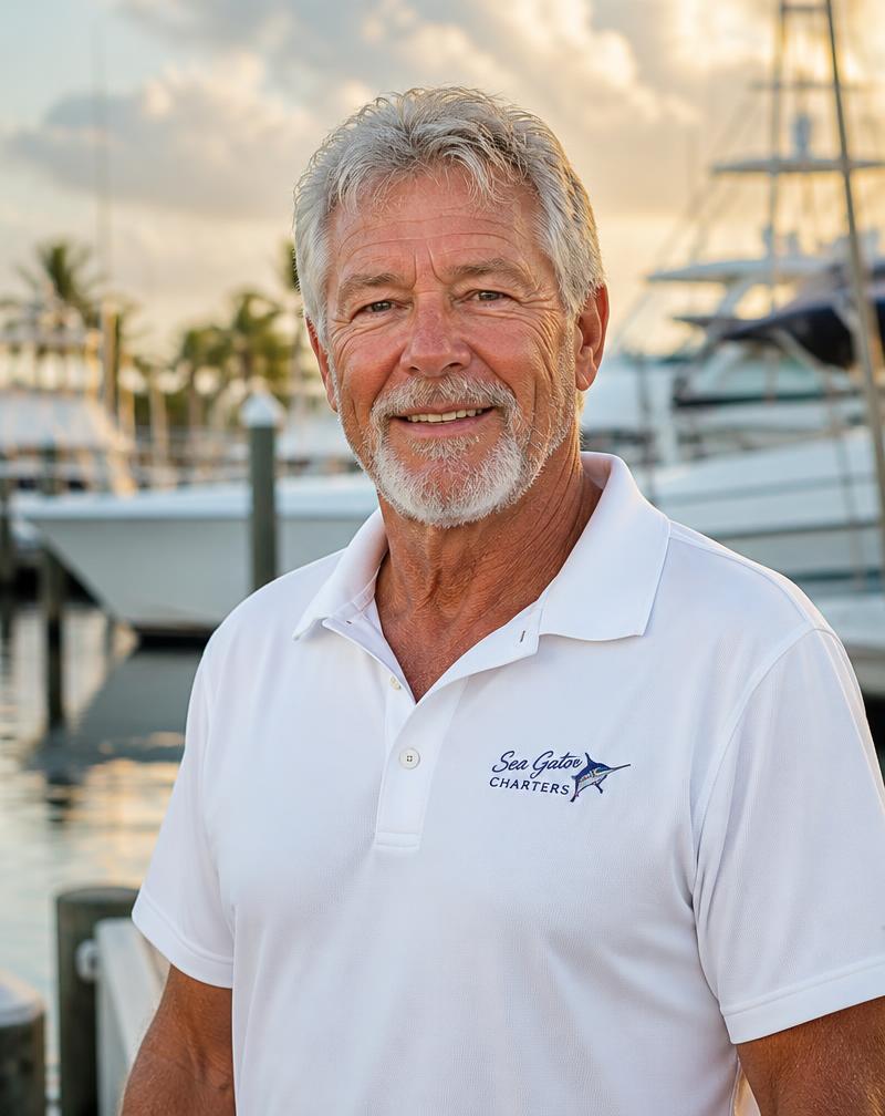 Captain Jim Hayek, owner of Luxury Boat Detailing, on a Florida marina dock